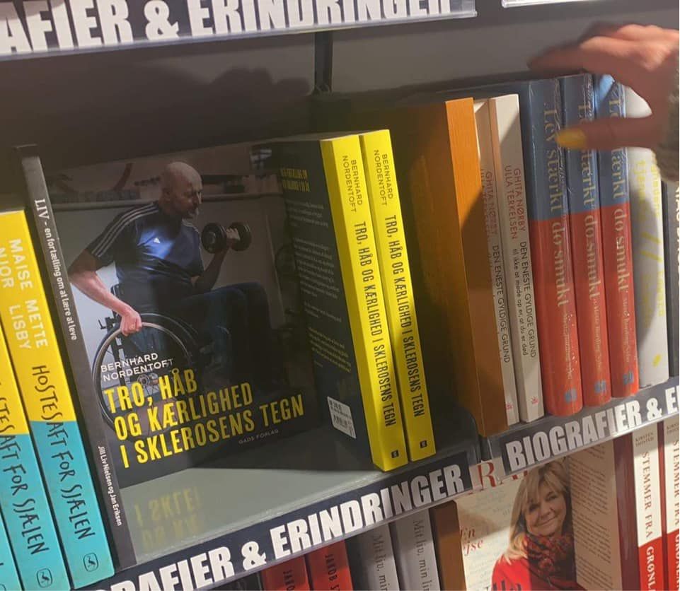 Book displayed on a bookshop shelf